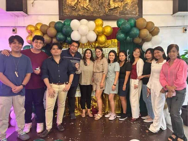 Indi-Phil team gathered together at a company event